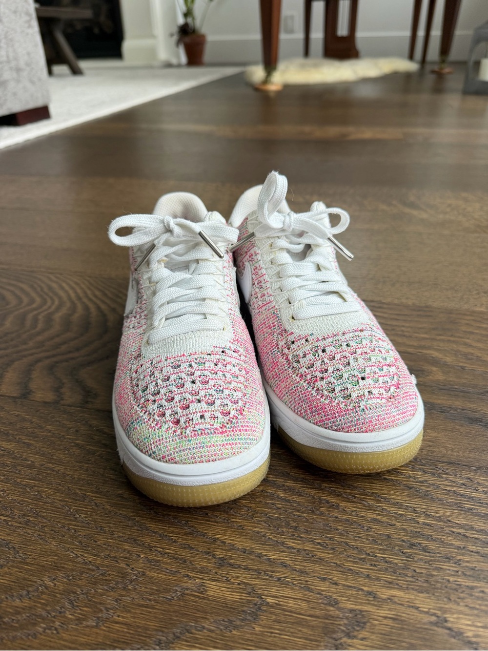 Nike Air Force Ones low Flyknit White and Pink Knit Sneakers